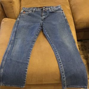 2 pairs of men’s fire retardant wrangler jeans.
